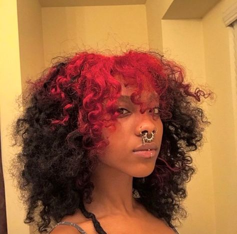 Alternative black girl Red Roots Curly Hair, Dyed Roots Curly Hair, Red And Black Hair Curly, Pink And Black Curly Hair, Curly Colored Hair Aesthetic, Curly Hair Under Dye, Dyed Short Curly Hair, Dyed Underlayer Curly Hair, Curly Dyed Hair