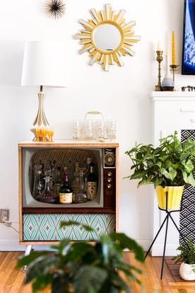 House Tour: A Kitschy, Boho Mashup in California | Apartment Therapy Funky Coffee Table, Funky Coffee Tables, House Customization, California Apartment, Domestic Partnership, Funky Kitchen, Kitschy Decor, Primitive Homes, Vintage Television