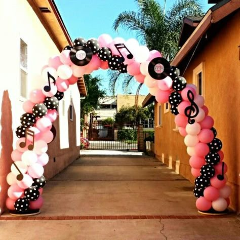 50's themed balloon arch...Arch is bout 8-9ft high. Used Pink, White & Black Polka Dot balloons. 50s Hoco Theme, 50s Theme Balloon Arch, Sock Hop Balloon Arch, 50s Balloon Decor, 50s Balloon Arch, Grease Themed Wedding, 50s Homecoming Theme, Retro Balloon Arch, Rock And Roll Balloon Arch