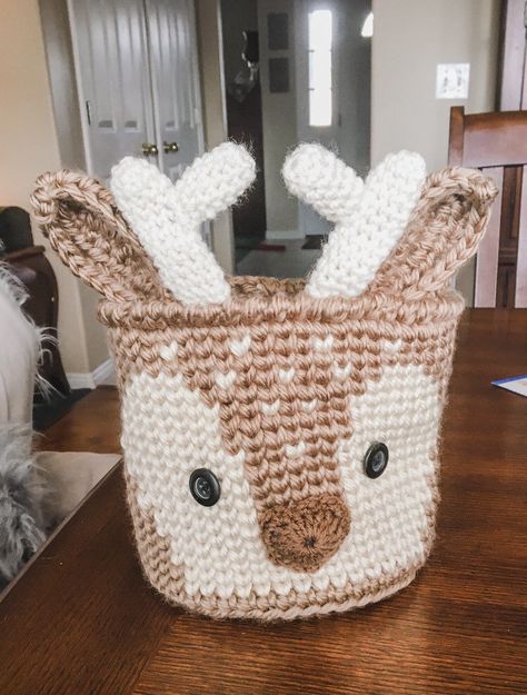 "Tan Deer Nursery Decor Basket - Woodland Nursery Storage - Crochet Deer Organizer This cute little fawn is ready to help you with all of your storage needs. He adds a cute touch of style to any Woodland Nursery Decor. He can hold your wipes, lotions, or diapers. Perfect for toys or towels or any other items that cry out for a unique storage space. This basket comes in 3 sizes: small - 7\" X 7\" Medium - 8\" X 8\"\" Large - 9\" X 9\" **add a little extra in height for the ears and antlers :) Mak Deer Themed Nursery, Deer Nursery Girl, Fawn Nursery, Baby Deer Nursery, Deer Nursery Decor, Tiny Nursery, Unique Nursery Decor, Forest Animal Nursery, Deer Nursery