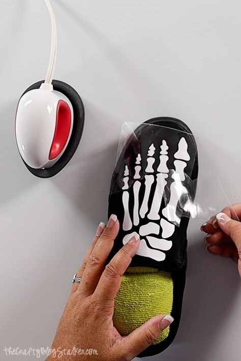 Make a pair of fun skeleton shoes using iron-on vinyl and your Cricut! Click here for a step-by-step tutorial with a video.#thecraftyblogstalker #skeletonshoes #cricut #cricutcreated Cricut On Shoes, Skeleton Shoes Diy, Diy Halloween Shoes, Cricut Shoes Projects, Vinyl On Shoes, Skeleton Shoes, Wood Burn Spoons, Halloween Shoes, Rhinestone Projects