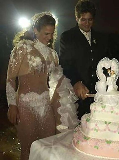 The worst wedding dresses of all time – including nearly naked brides, black gowns and gigantic feathers – The Sun Ugly Wedding Dress, Worst Wedding Dress, Rustic Cake Toppers, Wedding Anniversary Cake, Dressing Sense, Beautiful Wedding Cakes, Black Gown, Bride Wear, The Worst