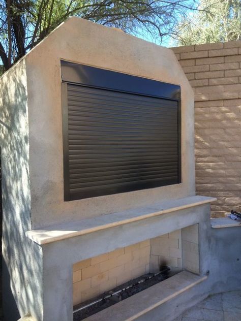 Outdoor TV Enclosure | TV Shutter Shield | Roll-A-Shield Outdoor Tv Cover Ideas, Outdoor Tv Area, Outdoor Patio Rooms, Patio Tv, Outdoor Tv Enclosure, Outdoor Tv Cabinet, Tv Enclosure, Outdoor Tv Covers, Diy Outdoor Fireplace