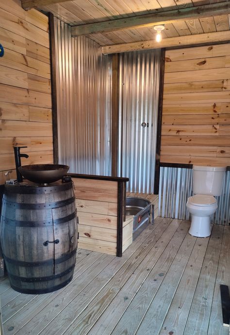 Tin Shower Walls Rustic Bathrooms, Backyard Bathroom Ideas, Tin Shower Walls, Galvanized Shower, Shed Bathroom, Easy Bathroom Upgrades, Rustic Bathroom Shower, Industrial Basement, Outhouse Bathroom