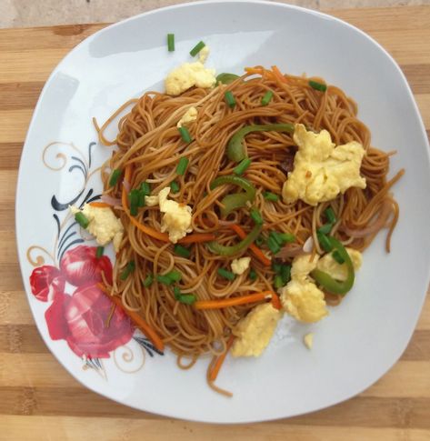 This spaghetti and vegetables stir fry with eggs is very easy and delicious. You can use any vegetables of choice and omit the eggs for a vegetarian option. Happy New Year! Yengyadze got a new cover and identity. It moved to biscuits and ladles and got lighted up (well under construction lighting up). I am … … Continue reading → Egg Spaghetti, Fried Spaghetti, Stir Fry With Egg, Vegetable Spaghetti, Vegetable Prep, One Pan Dinner, Carrot And Ginger, Ladles, Vegetable Stir Fry