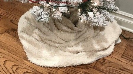 Using a Blanket as a Christmas Tree Skirt | ThriftyFun Throw Blanket Tree Skirt, Blanket As Tree Skirt Christmas, Blanket For Tree Skirt, Christmas Tree Blanket Skirt, Blanket Tree Skirt Ideas, Blanket As Tree Skirt, Xmas Tree Skirts Ideas, Pencil Tree Skirt Ideas, Blanket Tree Skirt