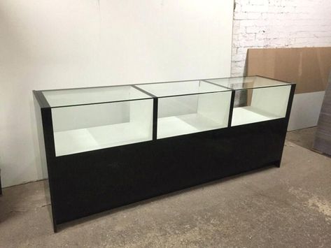 black display counters for mobile phone shop Mobile Shop Counter Design Modern, Glass Counter Design Shop, Mobile Shop Counter Design, Mobile Shop Counter, Display Counter Design, Coffee Shop Counter, Shop Counter Design, Glass Counter, Camera Display