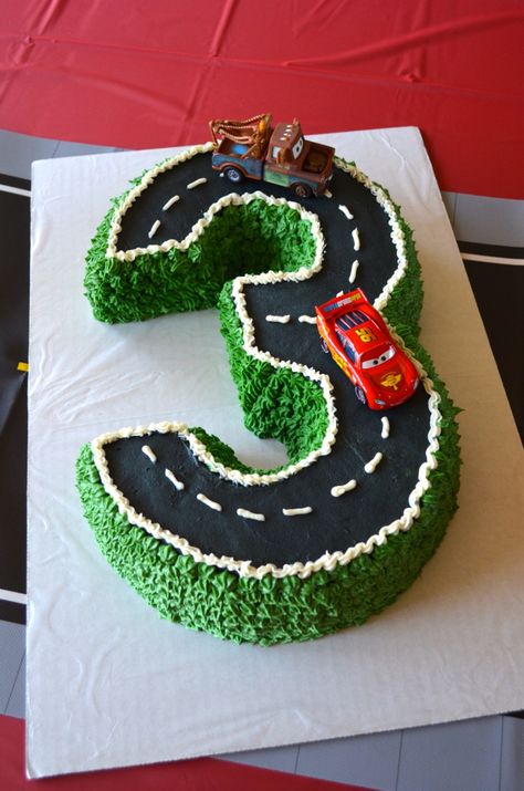 Cake for Disney Pixar Cars/Lightning McQueen third birthday party. Made with two Bundt cakes cut to shape the number 3. 4 Year Boy Birthday Cake, 4 Year Birthday Cake For Boys, Cakes For 4 Year Boy, Birthday Theme For 4 Year Boy, Birthday Cake For 4 Year Boy, Cake For 4 Year Boy, Auto Party, Pixar Cars Birthday, Cars Birthday Party