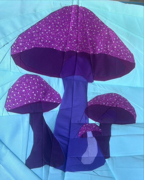 🌟 New Pattern Alert! 🌟 I’m excited to announce the release of my latest foundation paper piecing pattern: “Mystical Mushrooms”! 🍄✨ This pattern features a whimsical design with beautiful purple tones, perfect for adding a touch of magic to your quilts. Please note that this design is abstract, and any resemblance to other shapes is purely coincidental. I hope you enjoy creating with this unique pattern as much as I enjoyed designing it! …. But can you see it ….👀👀👀 Only available here https... Fantasy Quilt Patterns, Fantasy Quilt, Mystical Mushrooms, Foundation Paper Piecing Patterns, Purple Tones, Paper Piecing Patterns, Foundation Paper Piecing, Whimsical Design, Quilt Block Patterns