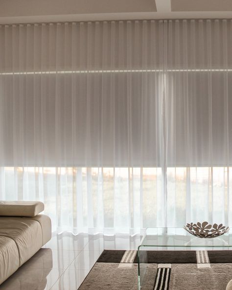 ✨ Transform Your Living Space with Style! ✨ Upgrade your home with our elegant sheer curtains and roller blinds. This stunning living room features a clean, modern design perfectly complemented by our window treatments. 🏡 Create the perfect blend of light and privacy. 💫 Elevate your home's aesthetic effortlessly. 🌟 Visit us at The Blind Factory for more inspiration! #HomeDecor #InteriorDesign #WindowTreatments #ModernLiving #TheBlindFactory #SheerCurtains #RollerBlinds Roller Blind With Sheer Curtain, Sheer Curtains Living Room, Curtains Over Blinds, Roller Blinds Living Room, Blinds And Curtains Together, Modern Roller Blinds, Sheers Curtains Living Room, Blinds Living Room, Blockout Blinds