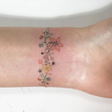 Wrist Bracelet Tattoos For Women, Wrist Bracelet Tattoos, Bracelet Tattoos For Women, Bracelet Tattoos, Tiny Flower Tattoos, Wrist Bracelet Tattoo, Ring Tattoo, Bracelet Tattoo, Flower Wrist Tattoos