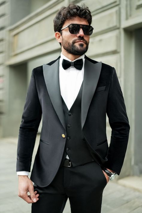 Elevate your evening ensemble with our Black Velvet Slim-Fit Tuxedo 3-Piece. The luxurious velvet fabric exudes sophistication and class, while the slim-fit cut enhances your masculine physique. Whether you're gracing the stage at a formal event or hosting a lavish dinner party, this tuxedo ensures you exude confidence and charm.  #tuxedo #blacktuxedo #velvettuxedo #suit #suits #slimfit #menstyle #menfashion #fashioninspo #formalwear #menclothing #formalattire Masculine Physique, Lavish Dinner, Suit Styles, Suit Stores, Slim Fit Suit Men, Slim Fit Tuxedo, Exude Confidence, Slim Fit Suits, Black Tuxedo