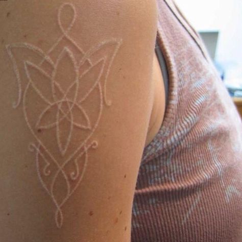 So you want to get a tattoo, but you don't want anyone to know about it. Whether it's because you want to protect yourself from the judgment of your parents, peers, or boss, or because it's something you want to do just for you, there are countless w… White Ink Tattoos, Lotr Tattoo, Lord Of The Rings Tattoo, White Ink Tattoo, Star Tattoo, Ring Tattoos, White Tattoo, Tree Tattoo, Skin Art