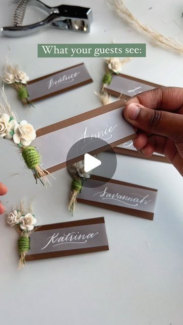 New Jersey Calligrapher | Stationery + Signage on Instagram: "Perfect placecards for a Boho or Rustic Chic event🤍

These calligraphy place cards cater to the natural, genuine aesthetic of the bohemian or rustic (might I even say farmhouse) decor, with a touch of sophistication elevating its overall appearance. 

No matter the theme, we can achieve your desired look with the change of color palettes, flower choice, and binding material.

Save this for inspo later! 

#eventplacecards #weddingtablesetting #weddingtabledecor #bohobirthday #rusticwedding flower place cards, pretty place cards, calligraphy place cards, boho chic event decor, boho chic baby shower, diy boho event decorations, #modernrusticdecor rustic wedding ideas boho graduation ideas, modern rustic wedding, vellum placecards" Genuine Aesthetic, Unique Place Cards Wedding, Wedding Vellum, Flower Place Cards, Boho Event, Boho Graduation, Flower Place, Diy Place Cards, Calligraphy Place Cards