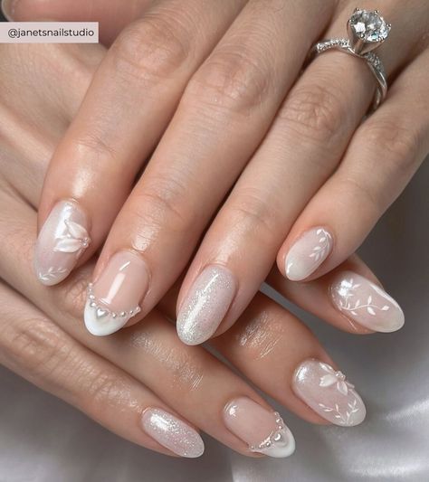 The best wedding nails for your big day: explore stunning wedding nail ideas and find the perfect style to complement your bridal look! Wedding nails for bride, classy bridal nails, wedding nails design, wedding nail ideas for the bride, bridal manicure, wedding nails white, wedding day nails, wedding nails natural, wedding manicures, wedding nails with glitter, wedding nails french manicure, wedding nails ombre, simple bridal nail art designs, best nails for wedding day, nails for your wedding. Wedding Nails For Bride Designs, Sparkle Bridal Nails, Winter Wedding Nail Ideas, Ombre Glitter French Tip Nails, Wedding Nails For Bride Short Almond, Bridal Gel Nails Wedding Brides, Champagne Bridal Nails, French Tip Nails For Wedding, Wedding Nails Natural