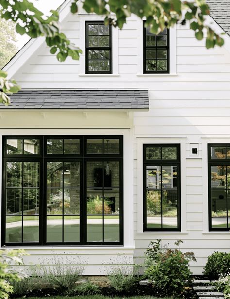 Upgrading your home’s exterior can increase not only your curb appeal but also your home’s property value. Black windows are a unique-looking accent for the exterior of your home and have recently become a popular choice in home decor. Finding the right siding to complement your black windows may seem like a small detail but […] Metal Door And Window Design, Modern Front Window Design, White Houses Black Windows, Black Paned Windows Exterior, Cape Cod Black Windows, White House Black Trim Windows, Black Windows White Siding, Black Awning Windows, Craftsman With Black Windows