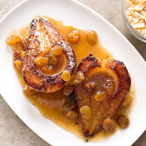 Roasted Pears with Golden Raisins and Hazelnuts A two-stage cooking process yields tender, beautifully caramelized fruits. Caramelized Fruit, Roasted Pears, Hazelnut Recipes, Donut Toppings, Roasted Pear, Roasted Apples, Caramel Tart, America's Test Kitchen Recipes, Golden Raisins