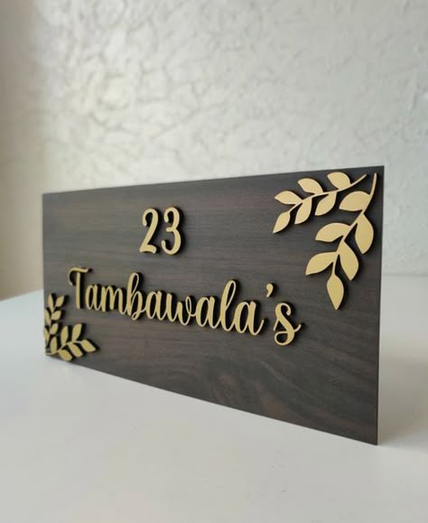 Wooden Nameplates Design, Ideas For Name Plate, Wooden Name Plates For Home Doors, Wooden Name Plate Design, Entrance Name Plate Design Modern Indian, Home Nameplate Design, Home Plate Design, House Name Plates Design, Home Number Plate Design