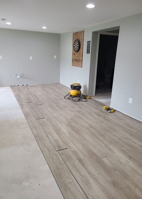 In our latest basement project, we installed wood look vinyl plank flooring over a concrete slab. Uncover insider tips and tricks to achieve a flawless finish and proper surface preparation, ensuring your DIY flooring project looks great for years. Weekend Home Projects, Vinyl Flooring Installation, Flooring Installation, Flooring Projects, Concrete Slab, Diy Flooring, Vinyl Plank Flooring, Types Of Flooring, Vinyl Tile