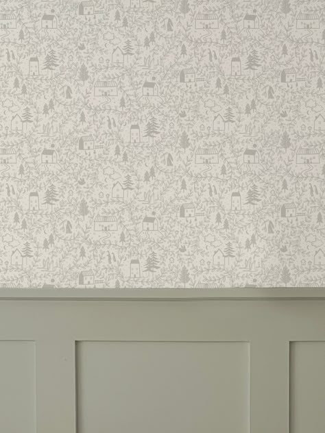 Cottages in the Woods Luxury Wallpaper is an intricate lineal hand illustrated design featuring whimsical cosy cottages surrounded by leafy foliage. Pairs beautifully with wall panelling. It also works as pretty cupboard or draw lining. • Printed to order in the UK on coated, non-woven traditional parchment wallpaper with a matte finish.• We recommend ordering a sample to check colours as they can vary on screens.• Please see below for more details and information on how to hang and care for you Nursery Woodland Wallpaper, Half Panel Half Wallpaper Nursery, Wood And Wallpaper Accent Wall, Nursery In Small Bedroom, Cottage Wall Panelling, Kids Room Wall Panelling, Nursery Accent Wall Wallpaper, Nursery Panelling And Wallpaper, Gender Neutral Wallpaper Nursery