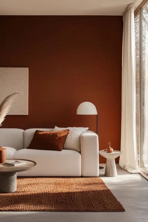 Top 7 Accent Wall Colors for a Cozy Fall Living Room Living Room With Orange Walls, Burnt Orange Paint Walls, Cinnamon Wall Color, Dark Rust Paint Color, Partially Painted Wall, Rust Color Accent Wall, Rust And Cream Living Room, Best Rust Paint Colors, Room Paint Color Ideas