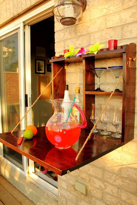 Great idea for outdoor storage and serving/bar. Turtles and Tails: It's Five O'Clock Somewhere Pull Down Bar, Living Pool, Backyard Bar, Patio Bar, Balcony Design, Outdoor Wood, Backyard Fun, Outdoor Bar, Mini Bar