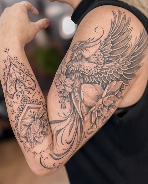 Phoenix Half Sleeve Tattoo For Women, Tattoos With White Ink Highlights, Phoenix Tattoo Feminine Arm Sleeve, Phoenix Arm Sleeve Tattoo, Phoenix Floral Tattoo Feminine, Phoenix Tattoo Design For Women, Phoenix Arm Tattoo, Phoenix Rising Tattoo, Fire Phoenix Tattoo