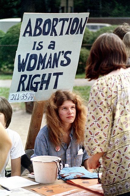 A Sign, Boston, A Woman, Signs