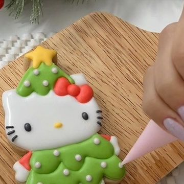 Jenny on Instagram: "Christmas tree Hello Kitty cookie!!! 🎄🎀😊 The stl file to 3d print this cookie cutter is in my Etsy ♡ #hellokitty #sanrio #christmas #hellokittylover #sanriocore #sugarcookies #cookiedecorating #decoratedcookies #customcookies #customsugarcookies #cookiesofinstagram #customdecoratedcookies #customcakes #royalicing #royalicingcookies #cakedecorating #cookies #cakes #dessert #foodie #foodart #edibleart #christmascookies #christmasgifts" Hello Kitty Christmas Cookies, Polymer Christmas, Sanrio Christmas, Hello Kitty Christmas Tree, Hello Kitty Cookies, Christmas Tree Cookies, Hello Kitty Christmas, Instagram Christmas, Iced Cookies