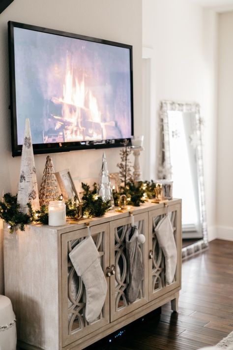 Christmas Holiday Home Decor | Home for the Holidays Tv Console Xmas Decor, How To Decorate Tv Stand, Entertainment Center Christmas Decor, Decor Ideas For Tv Stand, Ideas For Tv Stand, Decorate Tv Stand, Tv Stand Christmas Decor, Tv Console Decor, Christmas Tv Stand