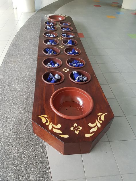 Giant Congkak board Mancala Board, Mancala Game, Arabic Dress, Cute Minions, Games Ideas, Cute Panda Wallpaper, Game Boards, Frame Stand, Bagan