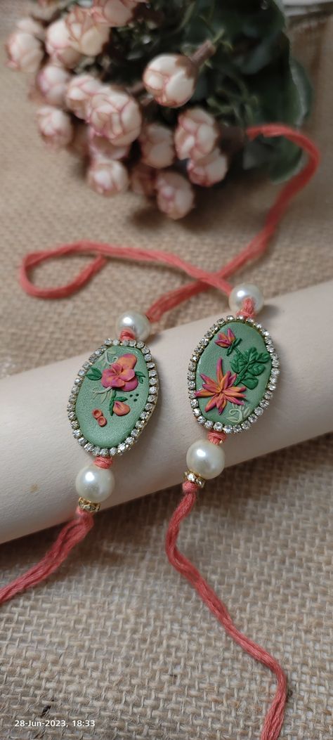 Rakhi With Molded Clay, Rakhi Painting Ideas, Mouldit Clay Rakhi, Clay Rakhi Ideas, Clay Rakhi Design, Polymer Clay Rakhi, Rakhi Diy Handmade, Rakhi Ideas Handmade, Diy Rakhi Handmade Ideas