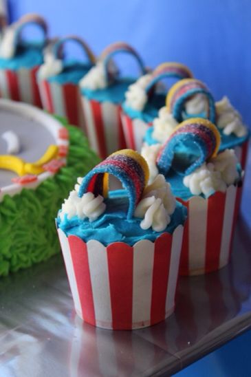 Rainbow Road Cupcakes beside our Mario Kart Cake Mario Kart Cake, Mario Kart Party, Mario Theme, Super Mario Birthday Party, Rainbow Road, Mario Birthday Party, Super Mario Birthday, Super Mario Party, Mario Birthday