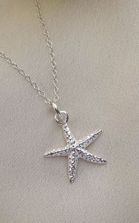 Carry a little bit of the ocean with you no matter where you go with our pretty sterling silver starfish necklace. A stunning everyday piece, this pretty necklace is perfect worn on its own or layered with other necklaces to create your own unique look. We think its styles best with beach wave hair, sun kissed skin and a cocktail (or mocktail) in hand!!    product details:. Choose from a 18" sterling silver cable chain. Charm material: sterling silver. Charm dimensions: approx. 15mm. Summer, Win Silver Starfish Necklace, Jewellery And Accessories, Girly Jewelry Silver, Summer Wishlist Products, Pretty Silver Necklaces, Jewellery Silver Necklace, Silver Beachy Jewellery, Cute Silver Necklace, White Silver Jewelry