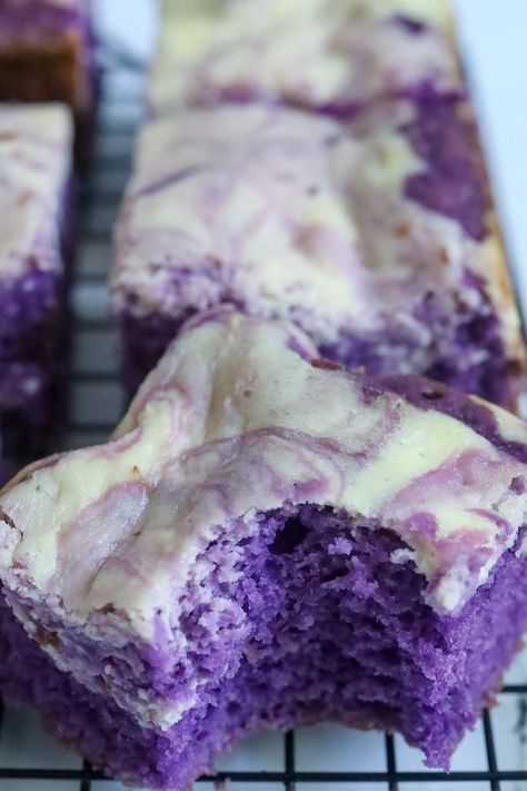 It's natural to associate brownies as being chocolatey by nature, but believe it or not, you can whip up a batch of brownies with no cocoa powder or chocolate in sight. This is an ube cheesecake brownie recipe and as the name suggests, the brownies feature that earthy ube flavor with an irresistibly creamy cheesecake layer on top. #ube #cheesecake #brownies Cheesecake Brownie Recipe, Ube Dessert Recipe, Ube Cheesecake, Ube Jam, Cheesecake Brownies Recipe, Ube Recipes, Filipino Food Dessert, Cheesecake Layer, Cheesecake Brownie