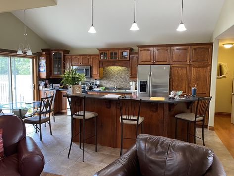 Oak Trim Living Room, Red Oak Kitchen Cabinets, Red Oak Kitchen, Trim Living Room, Dining Room Wall Color, Oak Mantle, Red Oak Floors, Blue Sectional, Oak Trim