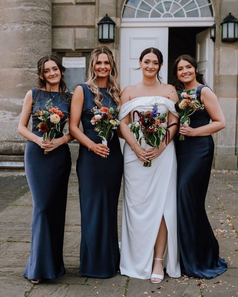 Celebrating Mr & Mrs Brady-Thompson 🤩 💍 Take a look at these gorgeous bridesmaids wearing our 'Joy in Midnight Navy Satin'... we are in LOVE with how they look! Wearing our Olivia & Rose dresses to an upcoming wedding? Don't forget to tag us in your photos or send them to us via DM for a chance to be featured on our page! 💌 📸 : @bohemianrosephotography Navy And Gold Wedding Party, Navy Bridesmaid Dresses With Groomsmen, Navy Bridesmaid Dresses Mismatched, Bridesmaid Dresses With Navy Suits, Mismatched Navy Bridesmaid Dresses, Navy Bridal Party, Navy Bridesmaids Dresses, Navy Bridal Parties, Navy Blue Groomsmen