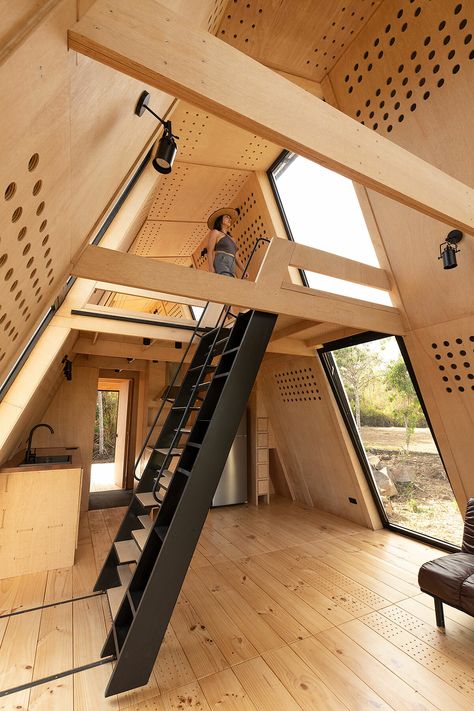 prefab SULA cabin journeys from quito to its galápagos island site Light Hardwood, Upstairs Loft, Light Hardwood Floors, Light Colored Wood, Casa Container, Prefabricated Houses, Zaha Hadid Architects, A Frame Cabin, Open Living Room