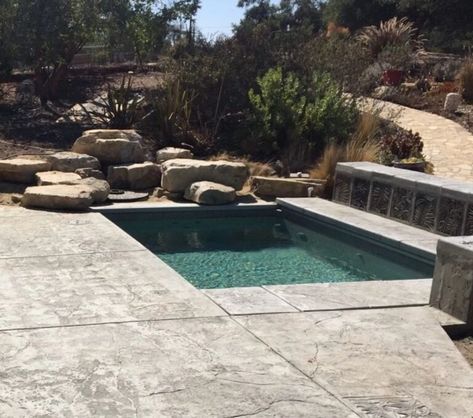 Top 22 Most Unique Pool Deck Ideas | Latham Pool Dark Bottom Pool, Latham Pool, Unique Pool, Decking Options, Stone Deck, Pool Deck Ideas, Concrete Deck, Freeform Pools, Paver Designs