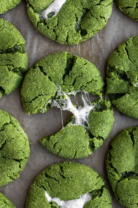 A matcha cookie stuffed with marshmallow broken in half on a cookie sheet Matcha Marshmallow Cookies, Matcha Mochi, Matcha Dessert, Matcha Cookies, Stuffed Cookies, Matcha Tea Powder, Marshmallow Cookies, Blossom Cookies, Henna Ideas