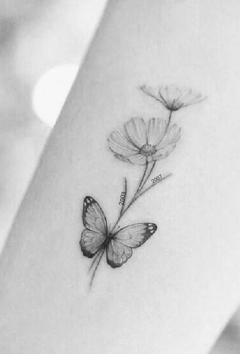 Matching Butterfly And Dragonfly Tattoo, Tattoos That Go With Flowers, Daisy Tattoo With Butterfly, Christian Butterfly Tattoo, Mum Tattoo Ideas, White Butterfly Tattoo, Daisy Flower Tattoos, Mum Tattoo, Unique Butterfly Tattoos