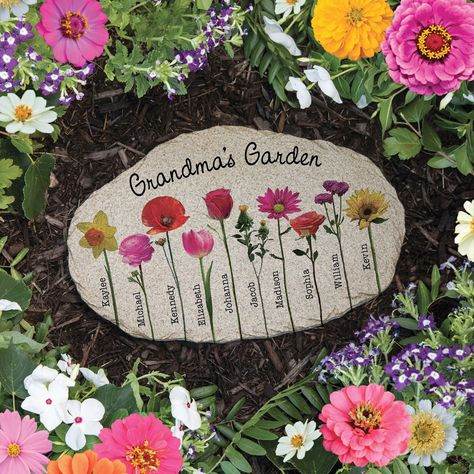 A heartwarminggift for a nature-loving parent or grandparent. Made of cast resin, the garden stone can be personalized with the name or phrase of your choosingat the top, up to 20 characters. Note that "Garden" is not standard text, please include with your personalization if you wish. Add 2to 10 individual names below, up to 9 characters each.Aunique flower will be added next to each name.You cannot choose which flower goes with which name. 11" x 7" x "h. Allow 3-4 weeks for delivery. Personalized Garden Stones, Stone Step, Pocket Scarf, Flower Identification, Grandmas Garden, Painted Rocks Diy, Family Garden, Unique Flower, Garden Yard Ideas