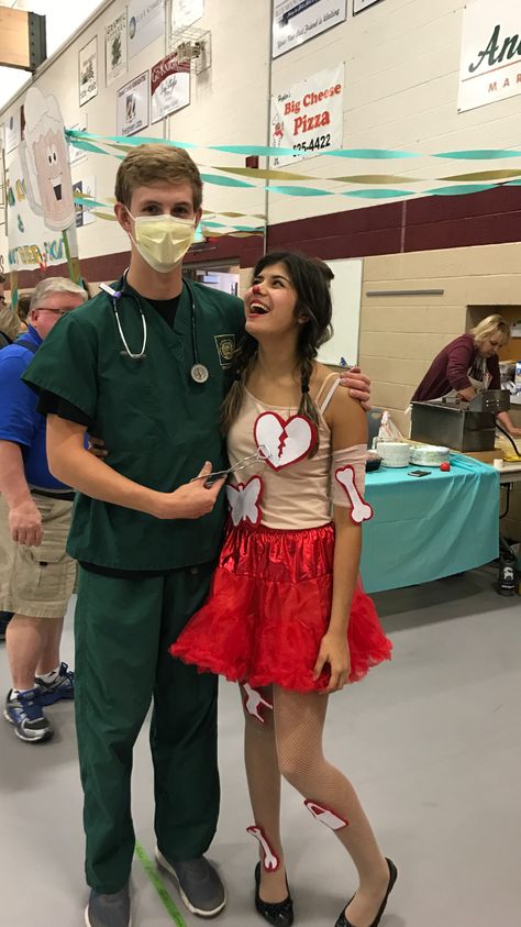 Operation and Doctor couple's Halloween costume Witch Doctor Couple Costume, Doctor Couple Costume, Nurse And Doctor Costume Couple Scrubs, Opposites Attract Costume, Nurse And Doctor Costume Couple, Nurse And Patient Costume Couple, Hot Doctors Female Costume, Operation Costume, Doctor Halloween Costume