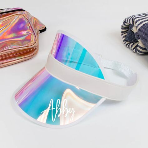 For each visor you plan to order, specify the number that correlates to your font of choice from the chart and include what you would like your personalization to say in the box provided (ex. 2, Bride)

Made of blue, purple, and pink tinted plastic, white structural fabric, white customizable vinyl, and an elastic band that adjusts to your head Beach Bachelorette Party Favors, Miami Bachelorette Party, Pretty Robes, Bach Party Ideas, Miami Bachelorette, Last Splash, Bachelorette Party Sunglasses, Scottsdale Bachelorette, Pool Party Favors