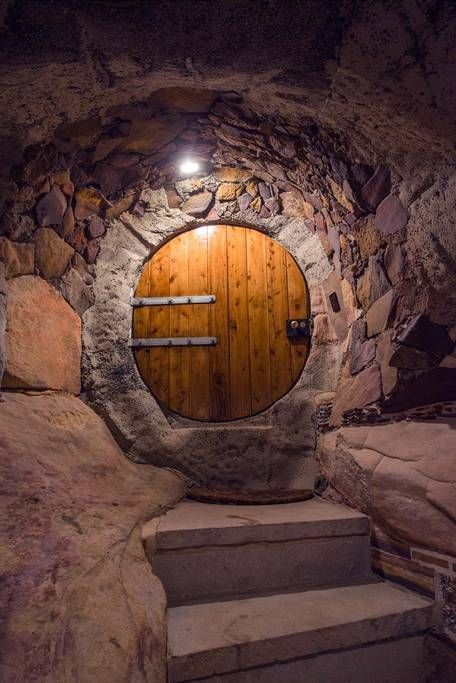 Check out this awesome listing on Airbnb: The Enchanted Cave - Caves for Rent in Bilpin Black Wolves, Earth Sheltered, Underground Homes, Cave House, Hobbit Hole, Out Of Place, Hobbit House, Earth Homes, Round Door