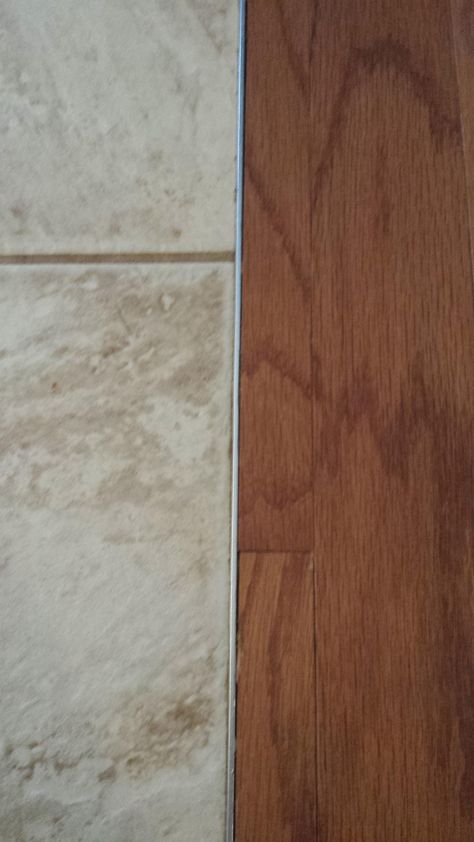 Can I install laminate next to tile ... Floor To Tile Transition, Wood Floor To Tile Transition, Tile To Wood Transition, Tile Transition, Floor Stain Colors, Wood Floor Stain Colors, Modern Wood Floors, Types Of Wood Flooring, Hardwood Floor Colors