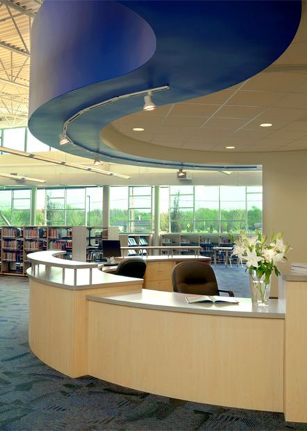 circulation desk idea Circulation Counter Library, Library Circulation Desk, Circular Reception Desk, Library Reception, Library Furniture Design, Collaborative Learning Spaces, Circulation Desk, Public Library Design, Desk Idea