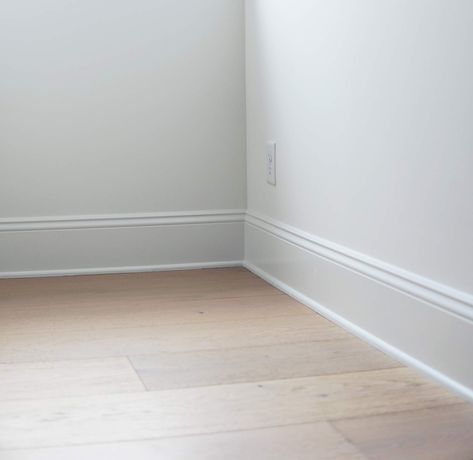 Wood vs MDF Baseboard Baseboard And Casing Combinations, Thick White Baseboards, White Walls And Baseboards, Studio Mcgee Baseboards, Baseboard Height Rules, White Oak Baseboards, Mdf Baseboard Trim, Transitional Baseboards, Cottage Baseboards