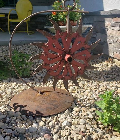 Repurposed farm yard art in 2022 | Metal yard art, Yard art, Outdoor metal art Yard Art Landscaping, Repurposed Farm Items, Plow Disc Ideas, Farm Equipment Decor, Simple Plant Hanger, Metal Garden Gates, Repurposing Ideas, Recycled Metal Art, Lawn Art