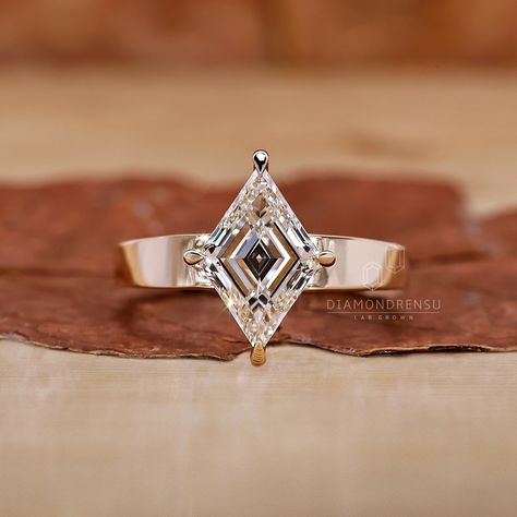 Embrace the allure of luxury with our Lozenge Diamond Solitaire Engagement Ring, an exquisite symbol of devotion and elegance. Each ring, available in your choice of yellow, white, or rose gold, is meticulously handcrafted by Diamondrensu. This ring is an epitome of modern sophistication, featuring a stunning 1 to 2 carat lab-grown diamond, certified by IGI. It's not just an engagement ring; it's an anniversary gift that any woman would cherish, boasting a wide band design that's as comfortable as it is beautiful. This handmade masterpiece by Diamondrensu is more than a ring - it's a declaration of love, crafted to perfection. ● Lab Diamond is also known as Lab Grown Diamond, CVD, HPHT, Green Diamond, Eco-Friendly Diamond, Ethical Diamonds, Earth-Friendly Diamonds, or Man-Made Diamond. ● ? Triangular Diamond Ring, Lozenge Engagement Ring, Lozenge Cut Engagement Ring, Solitaire Gold Engagement Ring, Lozenge Diamond, Dazzling Yellow Diamond-cut Ring, Herkimer Diamond Ring Engagement, Ethical Diamonds, Moissanite Vs Diamond